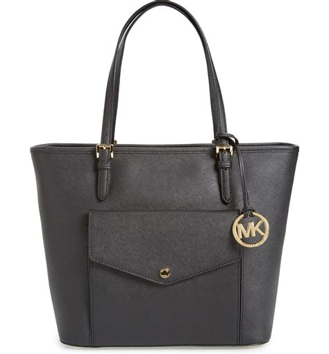 michael kors jet set tote that fix a laptop|Michael Kors large open tote.